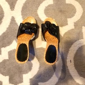 Womens heels beautiful black with large flower on top never used